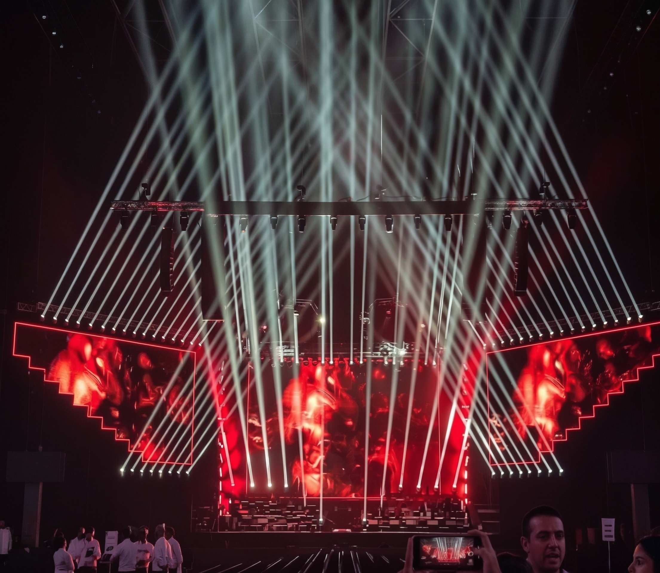 Event Production in Dubai: Hype Agency Partner BBP Group branding and stage design. Large scale concert and event production in Dubai with custom branding, managed by BBP Group in partnership with Hype Agency. The stage features complex lighting and large screens.